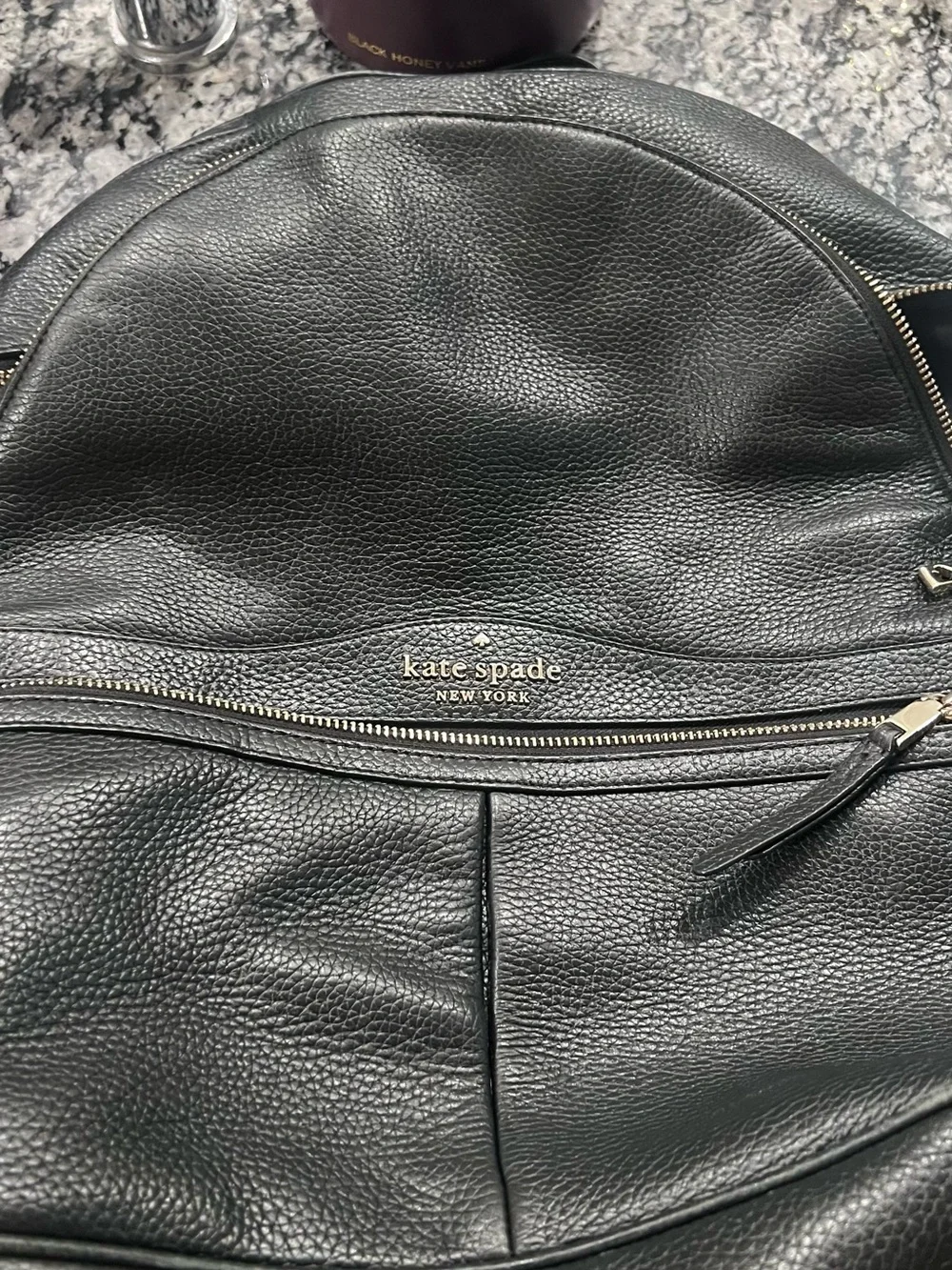 Kate Spade Black Pebbled Leather Backpack with Gold Accents